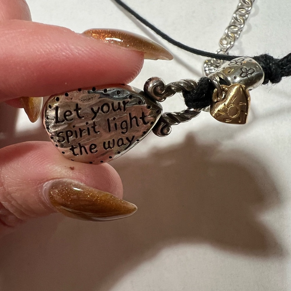 Brighton Black Cord Necklace with Silver and Gold Heart Pendant - Picture 4 of 5